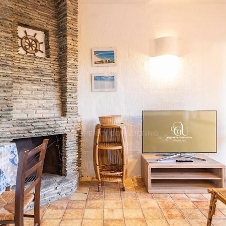 Апартаменты Il Glicine Cala Lupo Стинтино Экстерьер фото